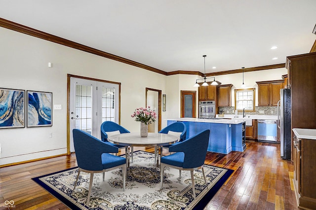 7178 Lockford N, Avon, IN 46123 - dining area with recessed lighting, baseboards, ornamental molding, and dark wood-style floors