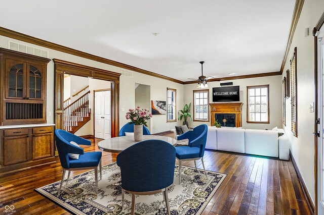 7178 Lockford N, Avon, IN 46123 - living area featuring visible vents, stairs, dark wood-type flooring, and ceiling fan