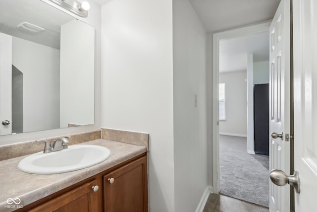 bathroom featuring vanity and tile patterned floors