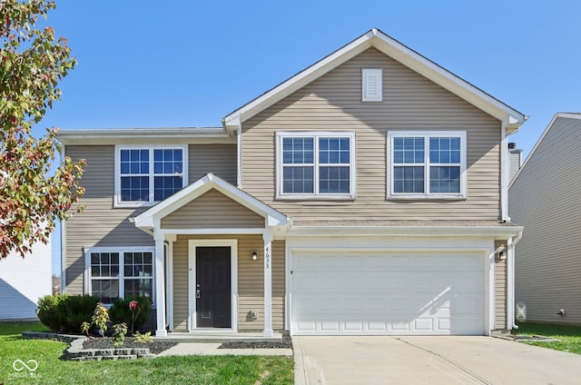 view of front property with a garage