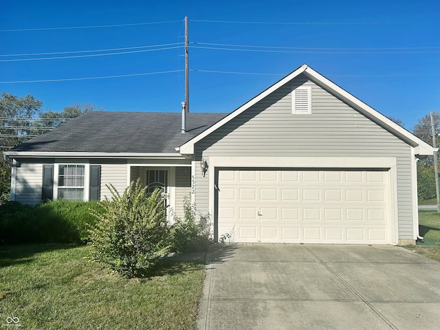 ranch-style house with a front lawn and a garage