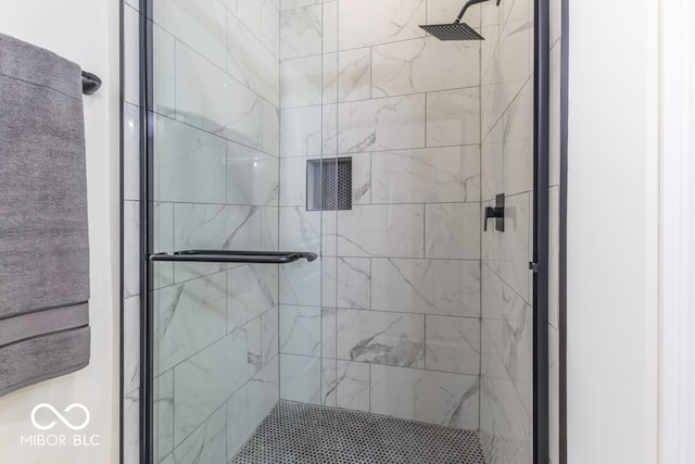 bathroom with an enclosed shower