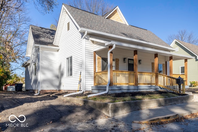 view of front of property featuring covered porch