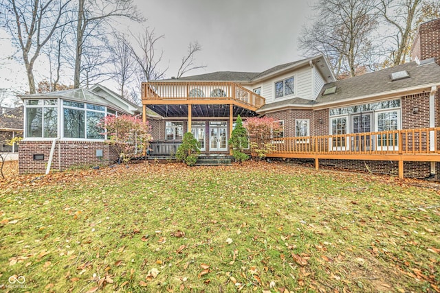 808 Copperfield Xing, Danville, IN 46122 - rear view of property featuring brick siding, a deck, a sunroom, a lawn, and a balcony