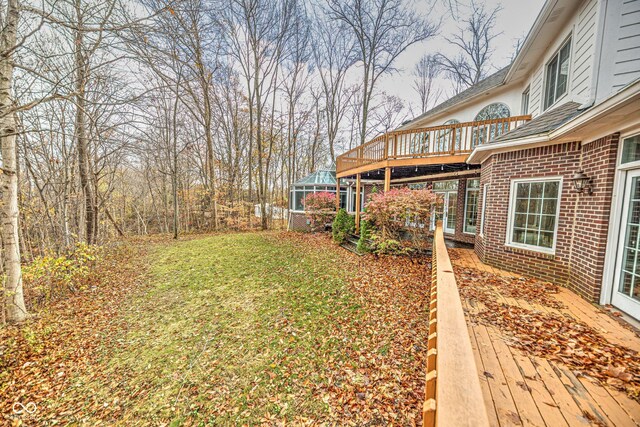 808 Copperfield Xing, Danville, IN 46122 - view of grassy yard with a wooden deck