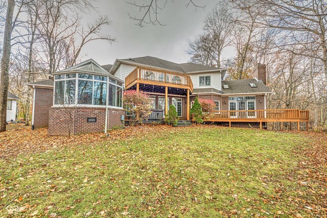 808 Copperfield Xing, Danville, IN 46122 - rear view of property with a sunroom, brick siding, a chimney, and a wooden deck