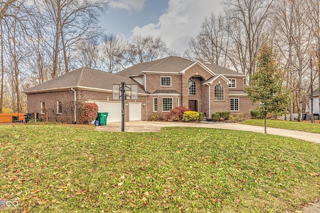 808 Copperfield Xing, Danville, IN 46122 - view of front of home with driveway, brick siding, a garage, and a front yard