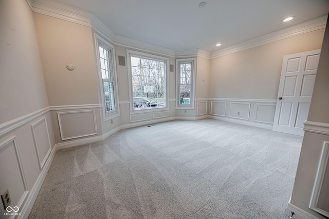 808 Copperfield Xing, Danville, IN 46122 - empty room with a decorative wall, light colored carpet, ornamental molding, recessed lighting, and a wainscoted wall