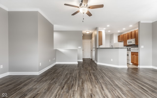 unfurnished living room with ornamental molding, dark hardwood / wood-style flooring, and ceiling fan