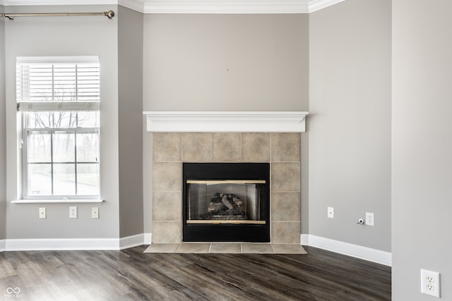 room details with hardwood / wood-style flooring and crown molding