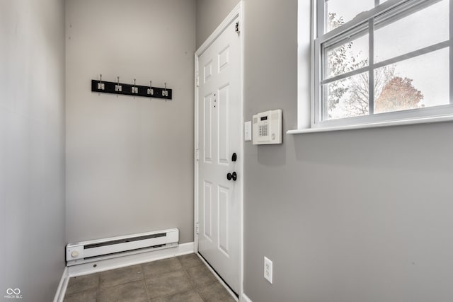 doorway with baseboard heating