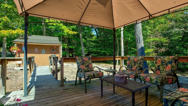 wooden deck featuring a gazebo