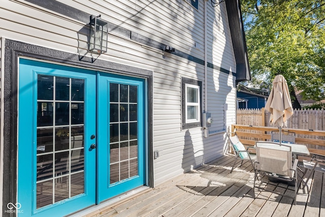 2221 E Michigan St, Indianapolis, IN 46201 - wooden deck with fence, french doors, and outdoor dining area