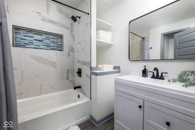 2221 E Michigan St, Indianapolis, IN 46201 - bathroom with wood finished floors, vanity, and  shower combination
