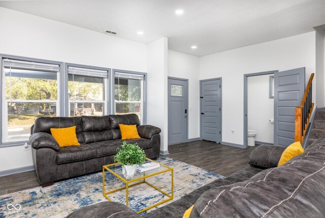 2221 E Michigan St, Indianapolis, IN 46201 - living area featuring recessed lighting, wood finished floors, and baseboards