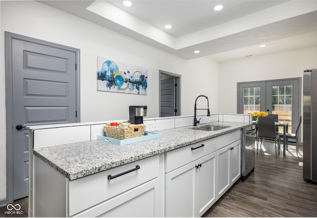 2221 E Michigan St, Indianapolis, IN 46201 - kitchen featuring white cabinets, recessed lighting, appliances with stainless steel finishes, and a sink