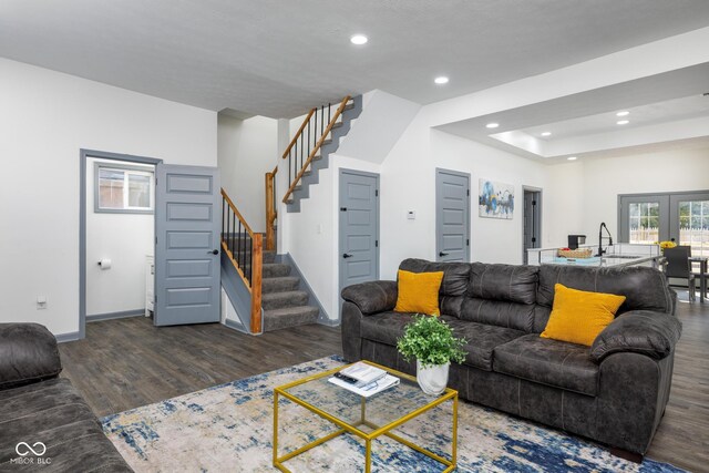 2221 E Michigan St, Indianapolis, IN 46201 - living area with baseboards, recessed lighting, wood finished floors, and stairs