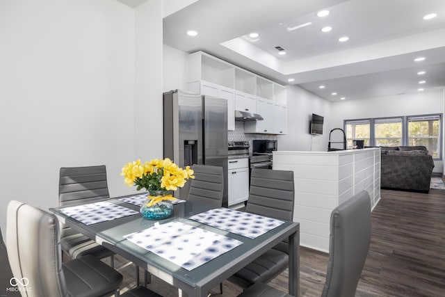2221 E Michigan St, Indianapolis, IN 46201 - dining area featuring dark wood finished floors, recessed lighting, visible vents, and a raised ceiling