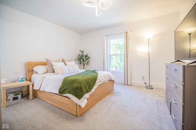 bedroom with light carpet