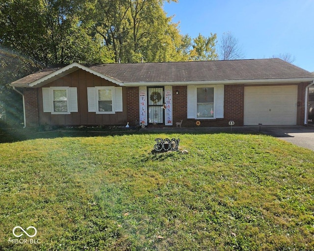 single story home featuring a front lawn and a garage