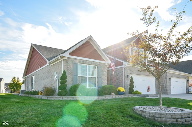 view of front of house featuring a front yard and a garage