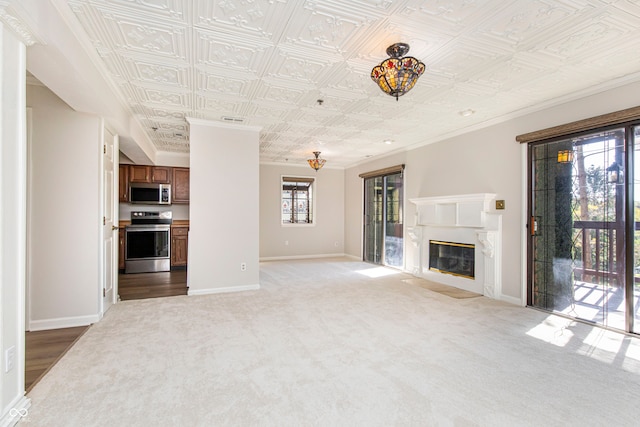 unfurnished living room with carpet