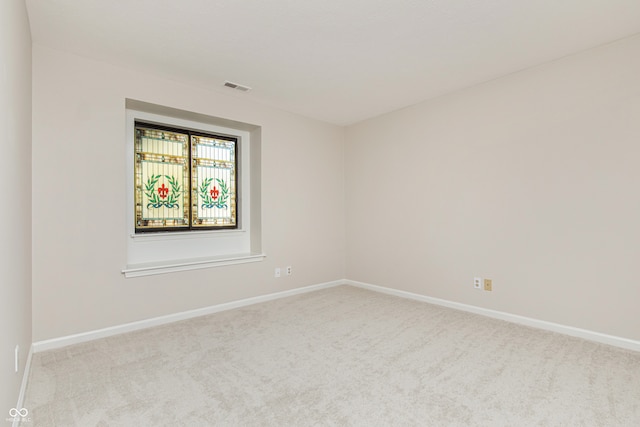 view of carpeted spare room