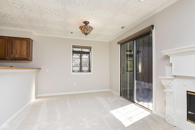 8168 Shorewalk Dr Unit A, Indianapolis, IN 46236 - unfurnished living room featuring baseboards, an ornate ceiling, and light carpet