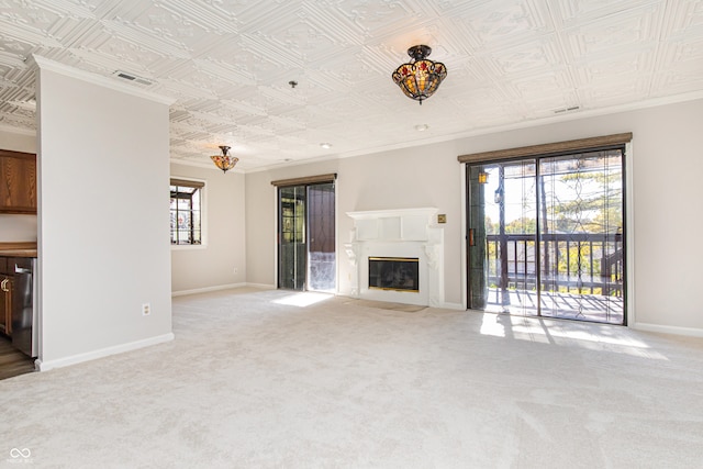 unfurnished living room with crown molding and carpet flooring