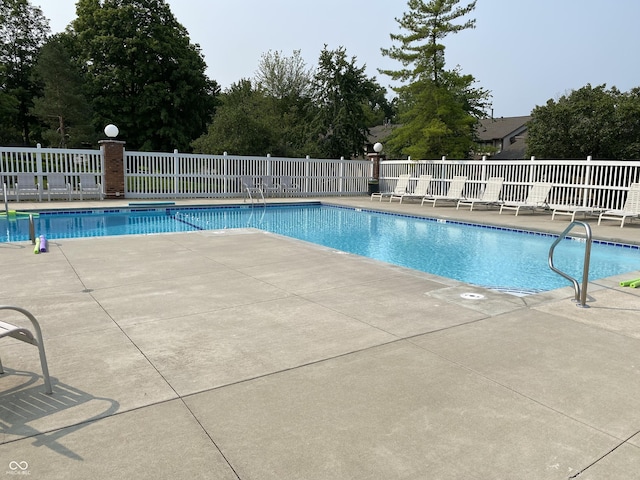 8168 Shorewalk Dr Unit A, Indianapolis, IN 46236 - community pool with a patio area and fence