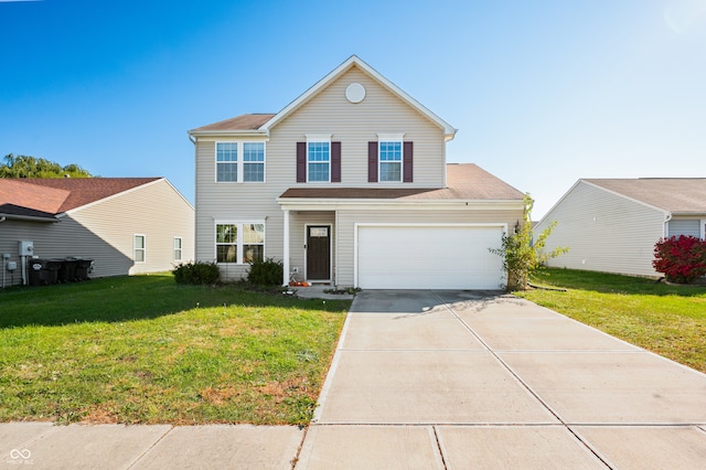 front facade featuring a front yard and a garage