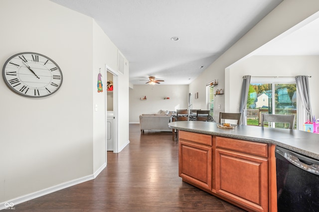 kitchen with dark wood-type flooring, ceiling fan, and dishwasher