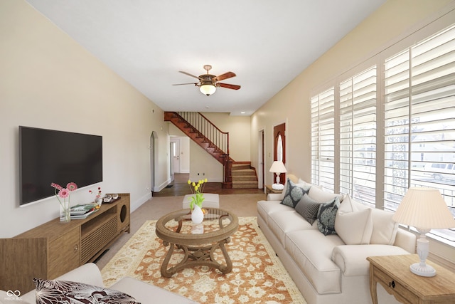 living room featuring ceiling fan