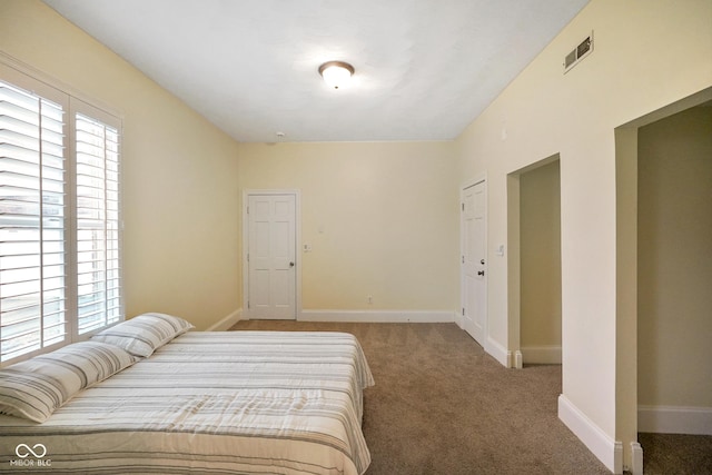 232 N Church St, Morgantown, IN 46160 - carpeted bedroom featuring visible vents and baseboards
