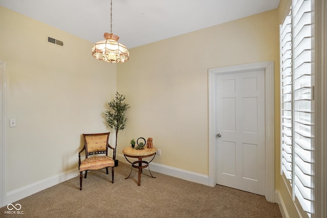 232 N Church St, Morgantown, IN 46160 - living area featuring visible vents, carpet flooring, and baseboards