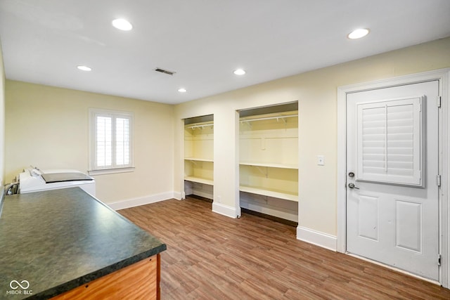 232 N Church St, Morgantown, IN 46160 - interior space with washing machine and clothes dryer, baseboards, wood finished floors, and recessed lighting