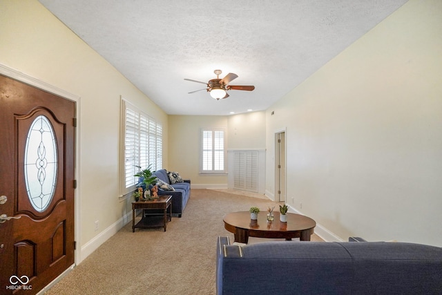 232 N Church St, Morgantown, IN 46160 - interior space with a textured ceiling, light carpet, baseboards, and ceiling fan
