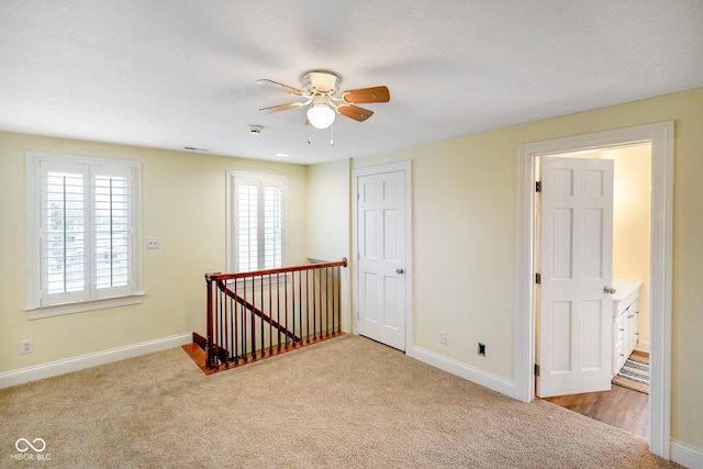 232 N Church St, Morgantown, IN 46160 - empty room featuring carpet floors, visible vents, baseboards, and ceiling fan