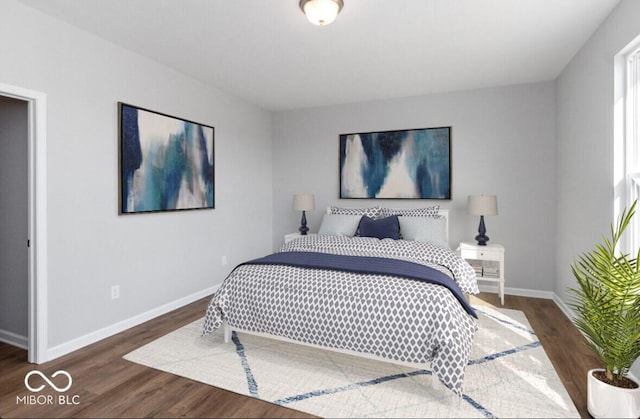 bedroom featuring dark wood-type flooring and baseboards