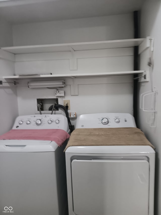 laundry area featuring separate washer and dryer