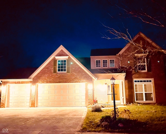 view of front of property with a garage