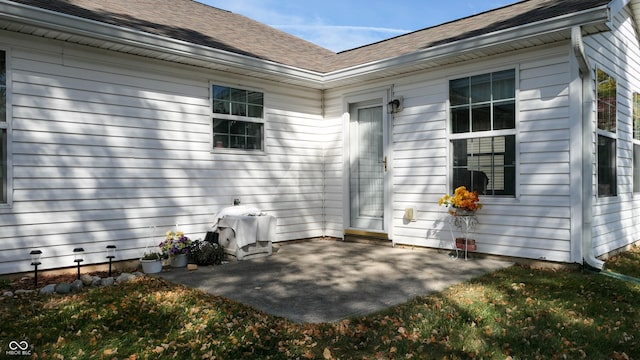 doorway to property with a patio