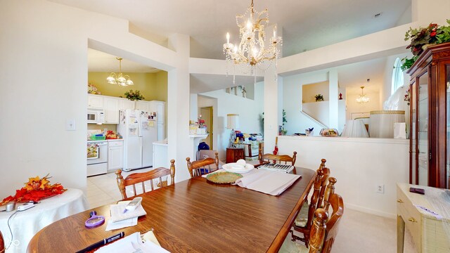 carpeted dining space featuring lofted ceiling