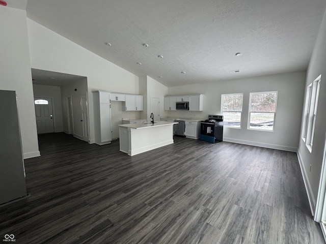 unfurnished living room with sink, high vaulted ceiling, dark hardwood / wood-style flooring, and a textured ceiling