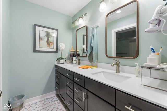 bathroom featuring vanity and an enclosed shower