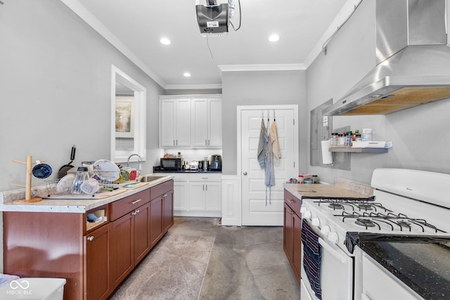 kitchen with white cabinets, ornamental molding, white gas stove, and range hood