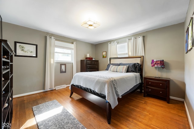 bedroom featuring hardwood / wood-style flooring