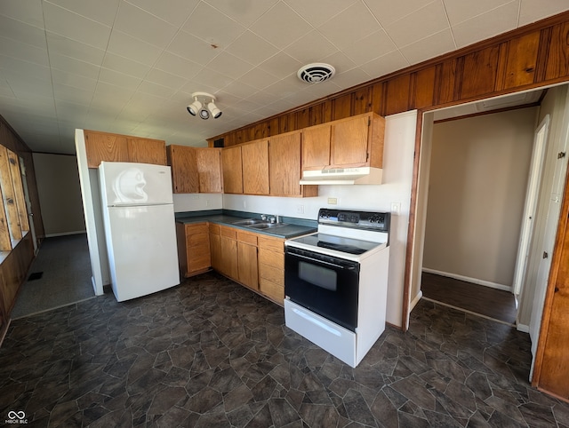 kitchen featuring sink and white appliances