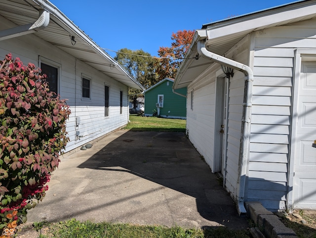 view of property exterior with a garage