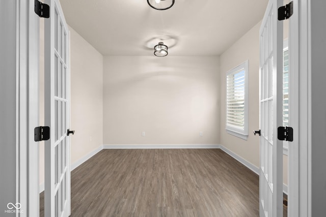 empty room featuring hardwood / wood-style flooring